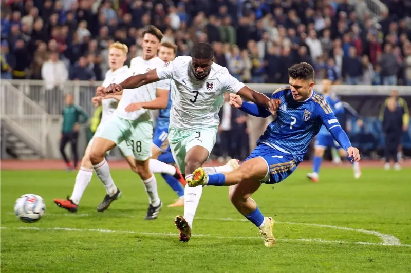 Austria stay top as Lang denies Kosovo victory with first international goal