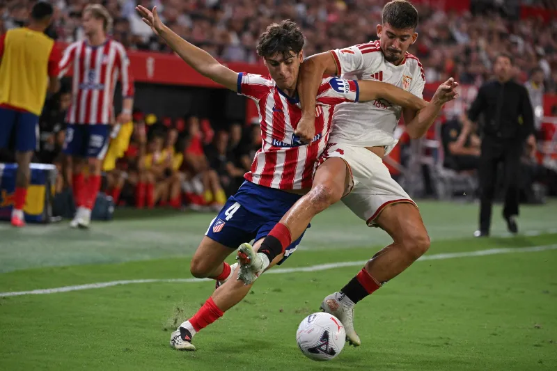 Atletico blitz Sevilla with ruthless 1st-half display to go top