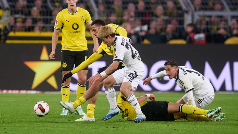 Dortmund move three points clear as Beier sinks Frankfurt