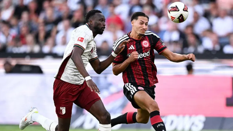 Augsburg go top of Bundesliga after stunning second-half rout of Frankfurt
