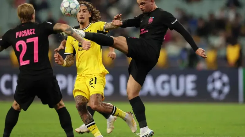Dortmund end winless run with hard-fought victory over Sabah